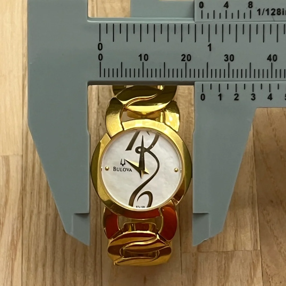 Bulova Ladies Watch Designer Gold Tone Bracelet Mother of Pearl Dial